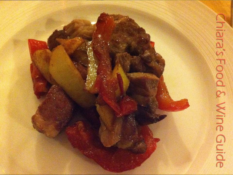 pork, potatoes, tomatoes with vinegar